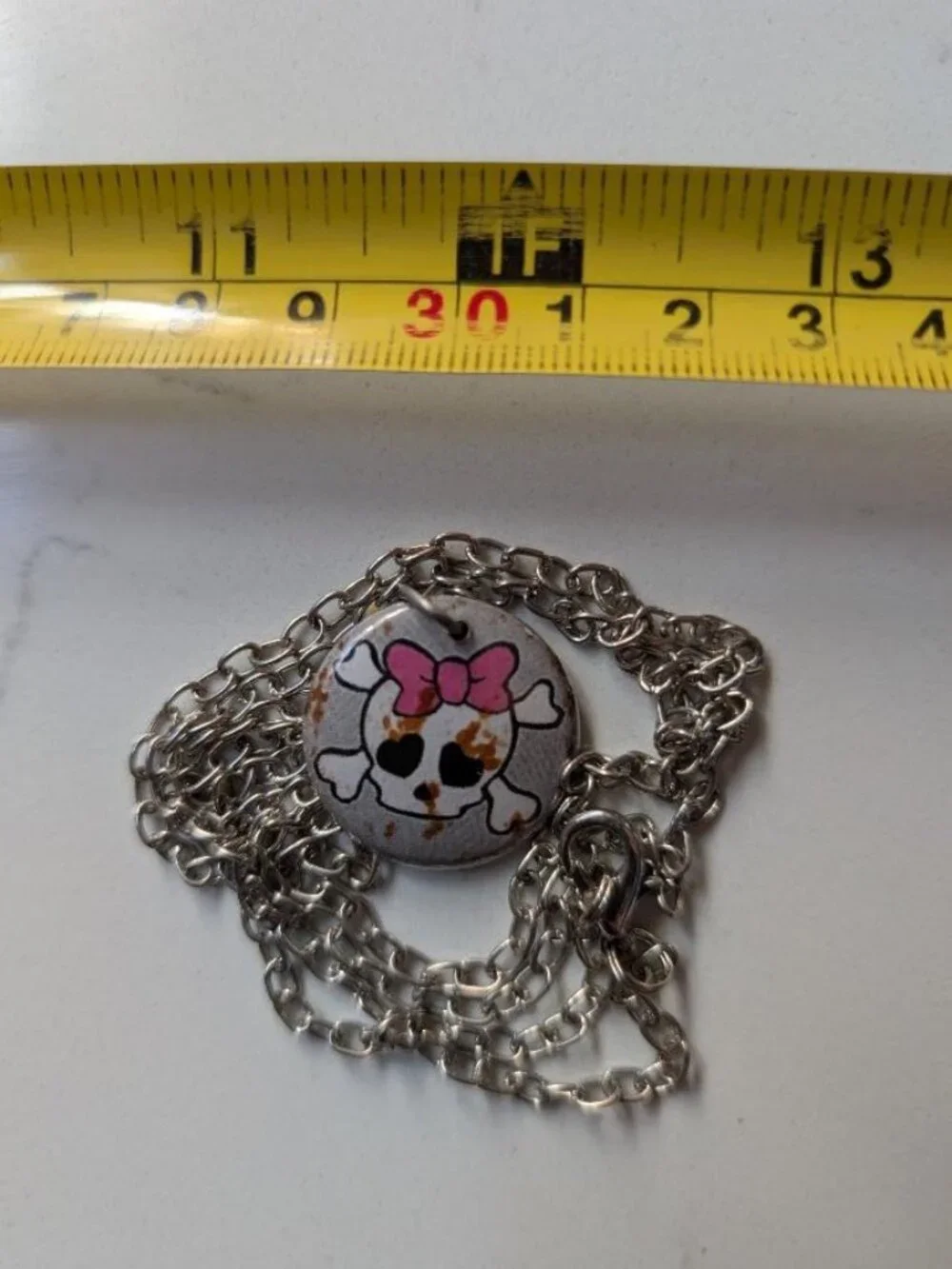 Cute Vintage Halloween Skull with Bones with a Pink Bow Pendant Necklace